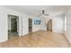 Bright bedroom with ceiling fan, tv, ensuite bathroom and walk-in closet at 1112 67Th Nw St, Bradenton, FL 34209