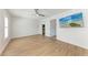 Bright bedroom with ceiling fan, tv and ensuite bathroom at 1112 67Th Nw St, Bradenton, FL 34209