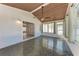 Sunroom with tiled floors, multiple windows, and paneled ceilings at 1112 67Th Nw St, Bradenton, FL 34209