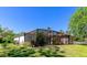 A spacious screened-in enclosure provides a private outdoor space with lush greenery, perfect for relaxation at 11419 Pine Lilly Pl, Lakewood Ranch, FL 34202