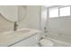 Clean bathroom includes a modern vanity with ample light and updated fixtures at 11419 Pine Lilly Pl, Lakewood Ranch, FL 34202