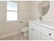 Bright bathroom offers modern vanity, fixtures, and ample counter space at 11419 Pine Lilly Pl, Lakewood Ranch, FL 34202