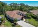 Aerial view of home with a well-maintained yard at 11419 Pine Lilly Pl, Lakewood Ranch, FL 34202