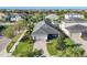 Aerial view of the property showcasing the manicured landscaping and tile roof at 11717 Blue Hill Trl, Lakewood Ranch, FL 34211