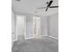 A spacious bedroom with ensuite access, and a large walk-in closet at 11717 Blue Hill Trl, Lakewood Ranch, FL 34211