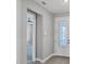 Home interior features tile flooring and a decorative glass front door at 11717 Blue Hill Trl, Lakewood Ranch, FL 34211