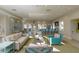 Inviting lounge area with comfortable seating, a kitchenette, and stylish decor at 11717 Blue Hill Trl, Lakewood Ranch, FL 34211