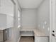 Office nook features granite countertop, wooden floors, and white walls at 11717 Blue Hill Trl, Lakewood Ranch, FL 34211