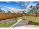 Backyard featuring a wooden fence and a fire pit at 1200 74Th N St, St Petersburg, FL 33710