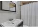 Bathroom featuring a tiled vanity counter, and shower at 1200 74Th N St, St Petersburg, FL 33710