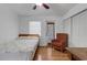 Bright bedroom featuring a cozy chair, closet and natural light at 1200 74Th N St, St Petersburg, FL 33710
