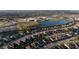 Panoramic aerial view of a Primary-planned community featuring modern homes, scenic lakes, and neighborhood schools at 12307 Blue Hill Trl, Bradenton, FL 34211