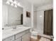 Bright bathroom with a shower, tub, and vanity at 12307 Blue Hill Trl, Bradenton, FL 34211