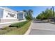 Community entrance to Mallory Park with lush landscaping plus a decorative tower at 12307 Blue Hill Trl, Bradenton, FL 34211