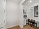 Office nook featuring built in desks for two, bright natural lighting, and modern decor at 12307 Blue Hill Trl, Bradenton, FL 34211