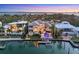 Waterfront estate with a pool, private dock, outdoor space, and views of the Gulf at 1333 Vista Dr, Sarasota, FL 34239