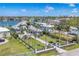 Large landscaped yard with palms and fence lines this luxury home and its waterfront location at 1333 Vista Dr, Sarasota, FL 34239