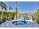 Backyard with hot tub, pool, dock and waterfront view at 1333 Vista Dr, Sarasota, FL 34239