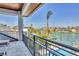 Elegant waterfront balcony with palm trees and scenic views, perfect for relaxing and enjoying the coastal lifestyle at 1333 Vista Dr, Sarasota, FL 34239