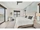 Serene bedroom with waterfront views, calming colors, and tray ceilings, creating a peaceful retreat at 1333 Vista Dr, Sarasota, FL 34239