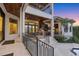 Back exterior with outdoor kitchen, stairs to pool and waterfront views at 1333 Vista Dr, Sarasota, FL 34239