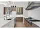 Modern kitchen with stylish lighting and a professional range at 1333 Vista Dr, Sarasota, FL 34239