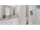 Bathroom with white cabinetry, granite countertops, a vessel sink, and a separate shower at 13708 Red Rock Pl, Lakewood Ranch, FL 34202