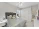 Bright bedroom features neutral tones and a ceiling fan at 13708 Red Rock Pl, Lakewood Ranch, FL 34202