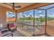 Inviting screened lanai with comfortable seating, offering views of the pool and lush landscaping at 13708 Red Rock Pl, Lakewood Ranch, FL 34202