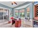 Home office featuring bay window, water view, and access to outdoor kitchen at 13708 Red Rock Pl, Lakewood Ranch, FL 34202