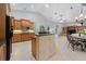 Open kitchen featuring lots of counter space, tile floors, and stainless steel appliances at 13955 Pine Woods E Ln, Sarasota, FL 34240