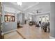 Spacious living area featuring tile flooring, high ceilings, and elegant architectural details at 13955 Pine Woods E Ln, Sarasota, FL 34240