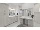 Elegant bathroom with double vanity, sleek countertops, and a walk-in shower featuring stylish tile work at 16768 San Edmundo Rd, Punta Gorda, FL 33955