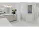 Spacious bathroom with double vanity, white marble floor, and contemporary design at 16768 San Edmundo Rd, Punta Gorda, FL 33955