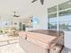 Outdoor hot tub area with stylish patio furniture and scenic lake views, perfect for relaxation at 16768 San Edmundo Rd, Punta Gorda, FL 33955