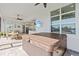 Covered patio with hot tub, dining area, and access to the house at 16768 San Edmundo Rd, Punta Gorda, FL 33955