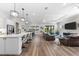 Open-concept living space with hard floors and lots of room for entertaining and Gathering time at 17916 Northwood Pl, Lakewood Ranch, FL 34202