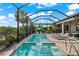 Beautiful in-ground swimming pool in a screened in pool area at 17916 Northwood Pl, Lakewood Ranch, FL 34202