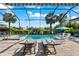 Screened-in pool with chaise lounges and chairs at 17916 Northwood Pl, Lakewood Ranch, FL 34202