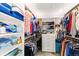 Walk-in closet offering generous shelving and storage solutions at 1928 Harbourside Dr # 1403, Longboat Key, FL 34228