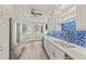 Bright, updated kitchen with stainless steel appliances, sleek countertops, and stylish backsplash at 1928 Harbourside Dr # 1403, Longboat Key, FL 34228