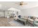 Spacious living room with an open layout, leading to a modern kitchen and dining area at 1928 Harbourside Dr # 1403, Longboat Key, FL 34228