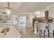 Stylish open-concept with a dining area, kitchen with breakfast bar, and an inviting living room at 19993 Benissimo Dr, Venice, FL 34293