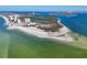 Stunning aerial view of the coastal community showcasing beautiful beaches and lush greenery, offering a serene waterfront lifestyle at 2100 Benjamin Franklin Dr # 104, Sarasota, FL 34236