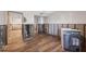 An unfinished laundry room with new flooring at 2100 Benjamin Franklin Dr # 104, Sarasota, FL 34236