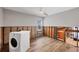 Bright laundry room with tile flooring, awaiting sheetrock at 2100 Benjamin Franklin Dr # 104, Sarasota, FL 34236