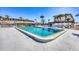 Community swimming pool offering a refreshing escape with clear water on a sunny day at 2100 Benjamin Franklin Dr # 104, Sarasota, FL 34236