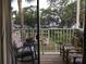 Relaxing balcony with chairs overlooking lush greenery, perfect for outdoor enjoyment at 2330 Canal Dr # G27, Bradenton, FL 34207