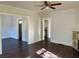 Spacious living room with hardwood floors, multiple entrances, and plenty of natural light at 2530 9Th W Ave, Bradenton, FL 34205