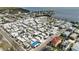 Aerial view of the community showcasing the charming homes and the neighborhood's coastal setting at 2601 Gulf N Dr # 221, Bradenton Beach, FL 34217